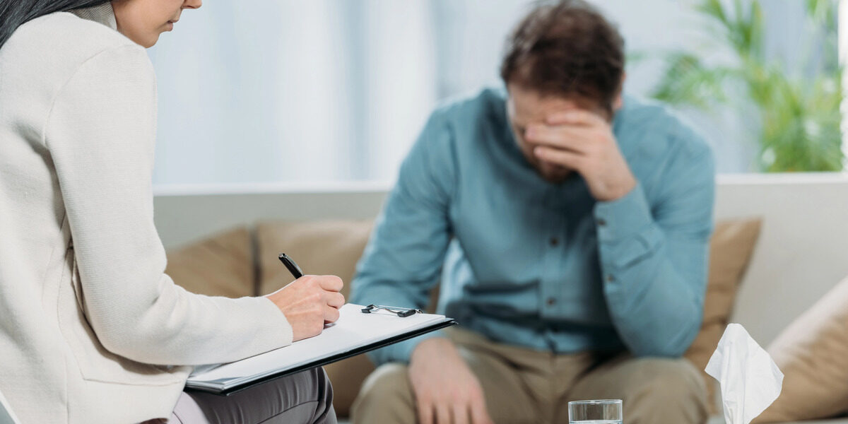 man receiving early mental health treatment